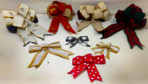 Wholesale burlap floral bows with natural jute construction for US florists, event planners, craft retailers, and gift packaging programs by Indian Crafts Supply